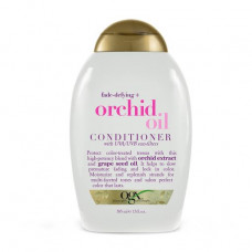 The conditioner OGX Fade-Defying + Orchid Oil Conditioner orchid Oil, for protection of color of a dyed hair, 385 ml
