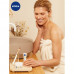 Cream against wrinkles for skin around eyes of Nivea Q10 Power of anti-aging, 15 ml