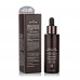 The rejuvenating ampoule serum for the person Ottie Black Signature Ampoule with mutsiny a black snail, 50 ml